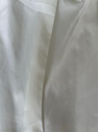 Abrigo blanco estructurado tipo paño polar