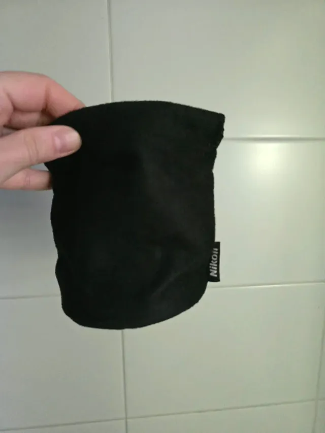 Funda objetivo nikon