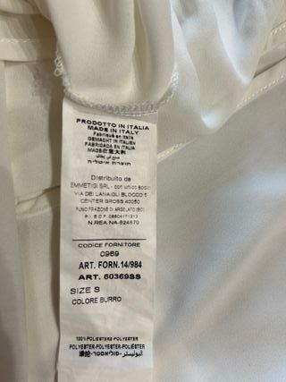 Blusa bianca con dettagli oro