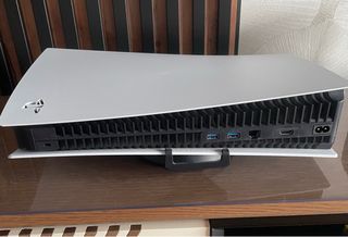 Consola PlayStation 5 + mando y 5 juegos