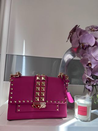 Bolso Michael Kors Rosa con Tachuelas Doradas