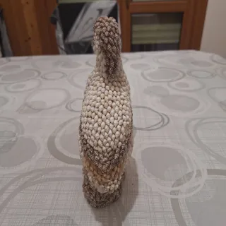 Soprammobile ricoperto di conchiglie