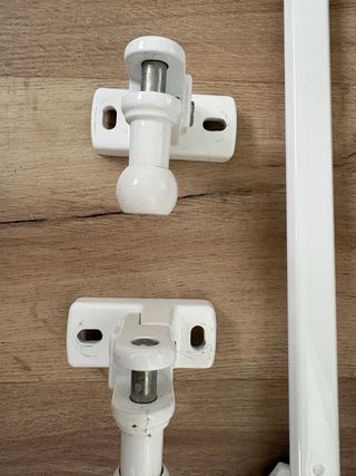 Brazos y anclajes para toldo