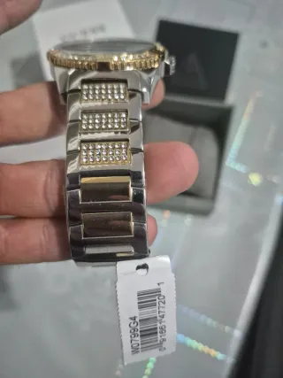 Reloj Guess Frontier dorado y Plata