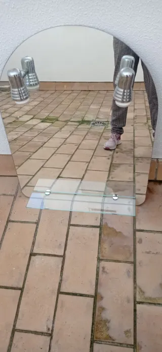 Espejo de baño ovalado con estante
