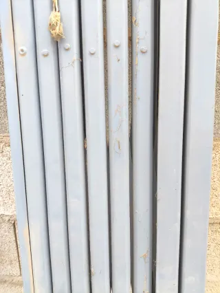 Reja plegable metálica o de ballesta