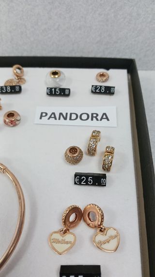 Pulsera y charms Pandora oro rosa