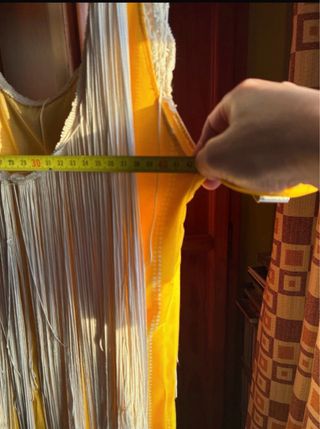Vestido de flamenca amarillo con flecos