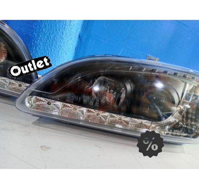 XC FAROS FORD FOCUS 04-08 LUZ DIURNA LED FONDO NEGRO R147020