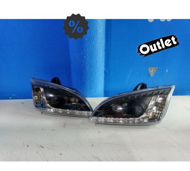 XC FAROS FORD FOCUS 04-08 LUZ DIURNA LED FONDO NEGRO R147020