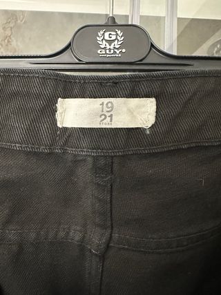 Jeans neri strappati