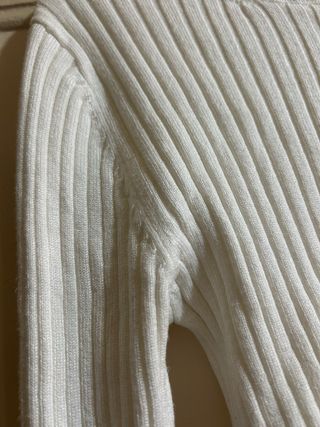 Jersey de punto blanco cuello alto