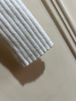 Jersey de punto blanco cuello alto