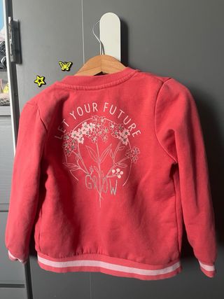 Chaqueta niña coral con volantes