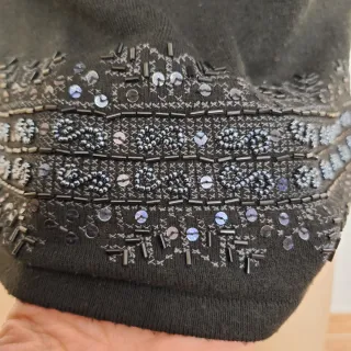 Top donna nero ,senza maniche con pailletes