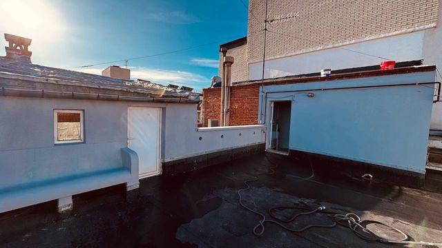 Pintura de fachada en altura