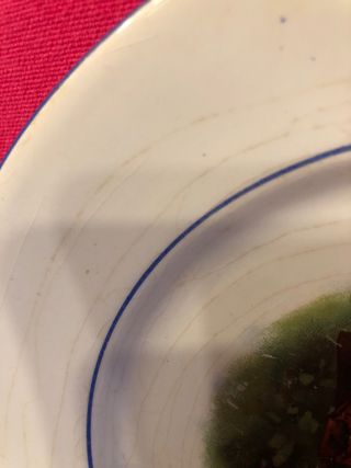 Plato antiguo decorativo niña  ,  un desconchon