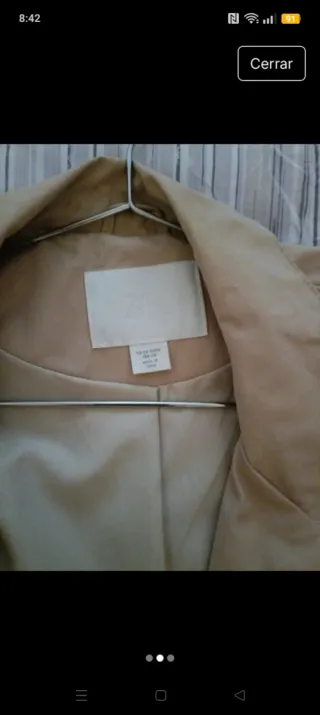 Gabardina beige Talla 14 pero es grande