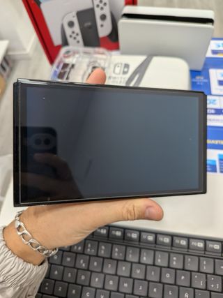 NINTENDO SWITCH OLED BLANCA + 4 JOYCONS + FUNDA