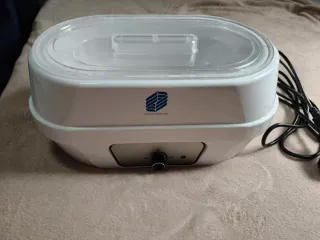 Calentador de parafina blanco