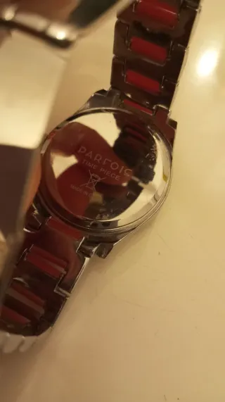 Reloj Parfois plateado y rojo coral