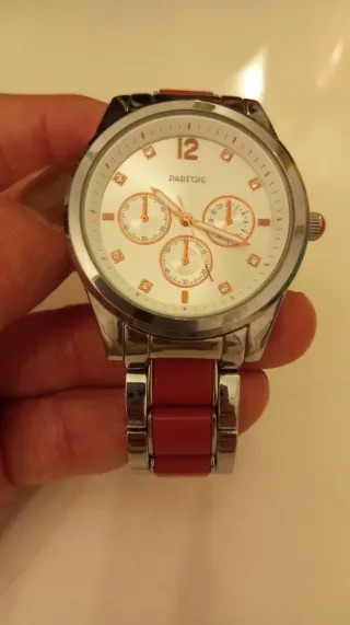 Reloj Parfois plateado y rojo coral