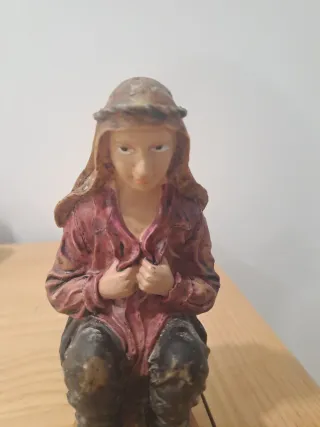 Figura Belén caganet