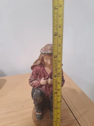 Figura Belén caganet