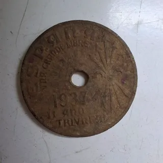 Moneda 25 Cts con agujero y escudo