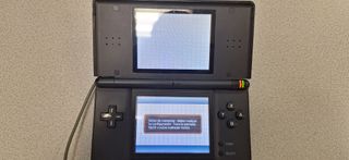 Nintendo DS Negra con cargador