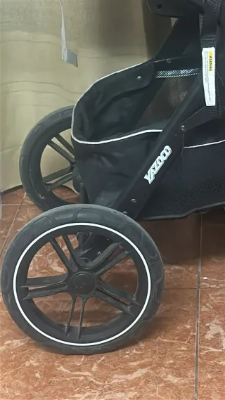 Carro de bebé con silla de coche