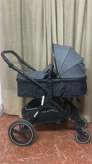 Carro de bebé con silla de coche