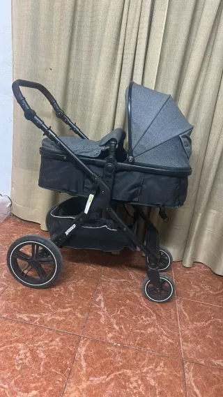 Carro de bebé con silla de coche