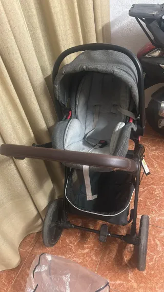 Carro de bebé con silla de coche