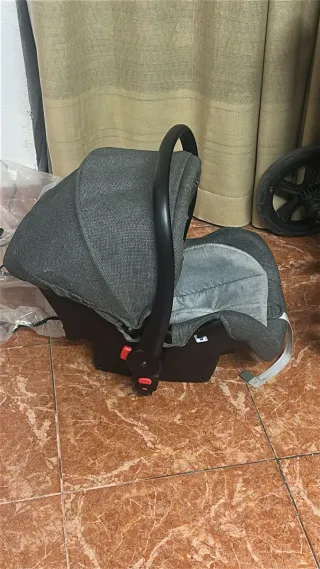 Carro de bebé con silla de coche