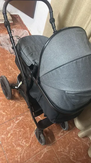 Carro de bebé con silla de coche