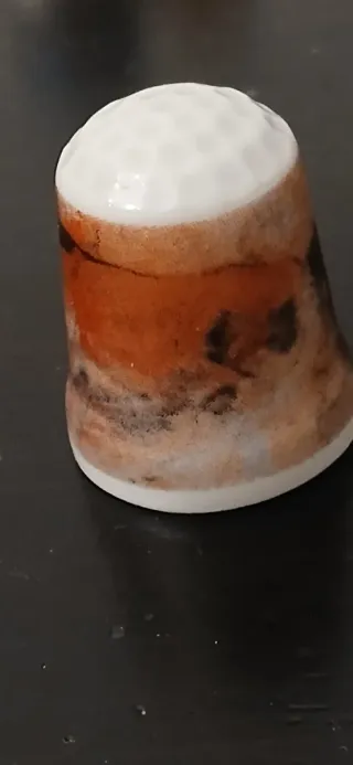 Collezione di ditali in porcellana