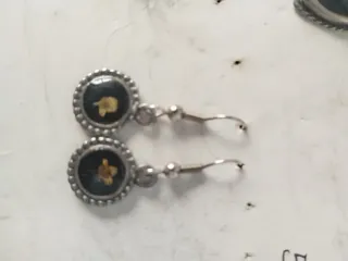 Pendientes colgantes plateados con flor