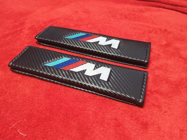 BMW FUNDA CINTURONES EMBLEMA M 2 unds