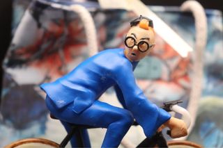 Figura Tintin y Milú en bici resina ABS