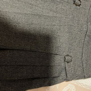 Falda gris cuadros pequeños con pliegues