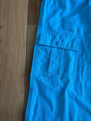 Pantaloni bambina azzurri con fiori fucsia 8 anni