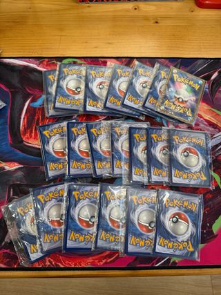 Lotto 10 pacchetti Pokemon