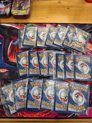 Lotto 10 pacchetti Pokemon