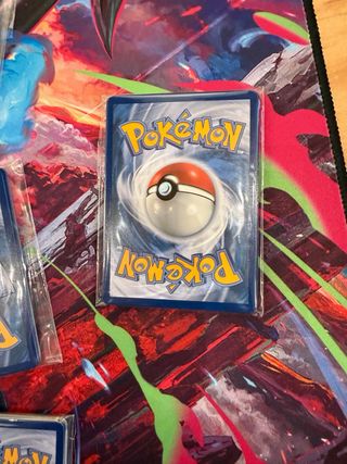 Lotto 10 pacchetti Pokemon