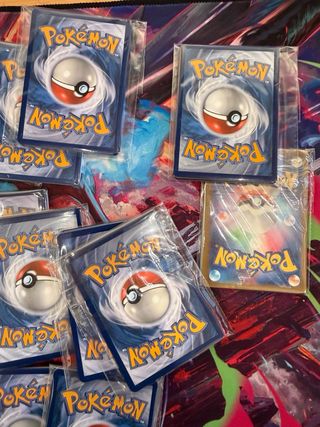 Lotto 10 pacchetti Pokemon