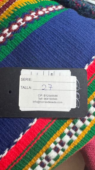 Manta fajín y calcetines a estrenar