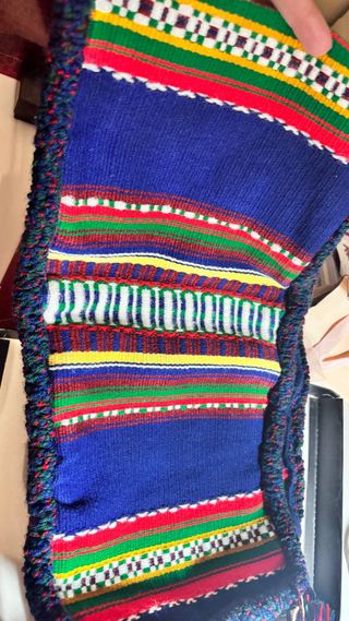 Manta fajín y calcetines a estrenar