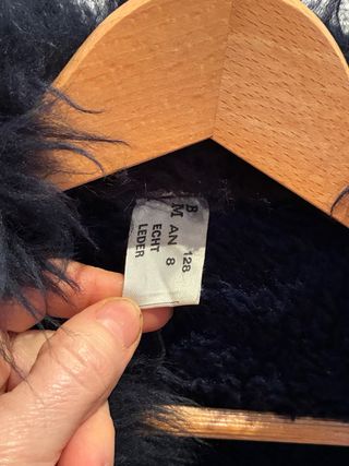 Abrigo piel niña negro talla 128cm