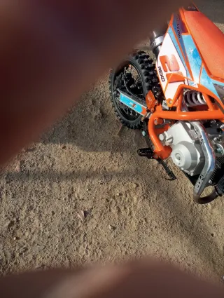 Moto 110cc Automática Naranja/Roja muy nueva